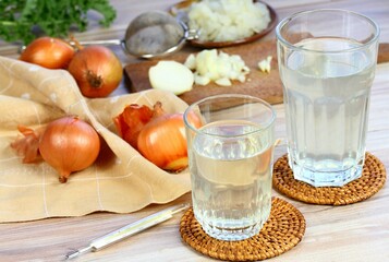 Hot onion tea against cough and flu.  Homemade tea from raw cut onion and hot water.