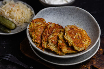 Potato pancakes in a bowl. Draniki.