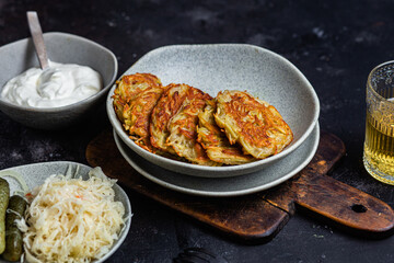 Potato pancakes in a bowl. Draniki.