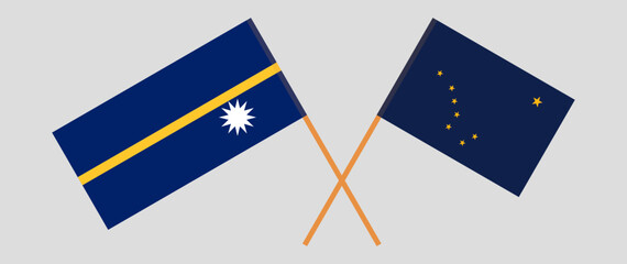 Crossed flags of Nauru and the State of Alaska. Official colors. Correct proportion