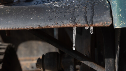 Small icicles on an old truck on a cold winter's morning.