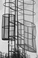Metal ladder with shadow on the wall