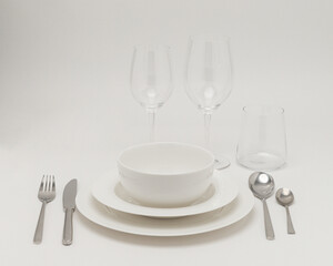 a set of white dishes for the kitchen