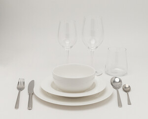 a set of white dishes for the kitchen
