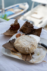 French mountains cheese banon wrapped in chestnut leaves made in Provence from unpasteurised goat milk