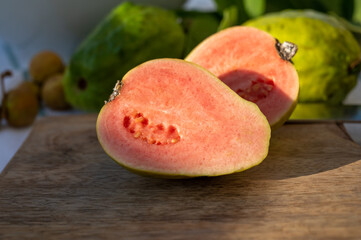 Tasty tropical exotic fruits, ripe fresh pink guava