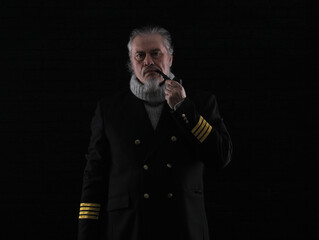 ship captain with a smoking pipe