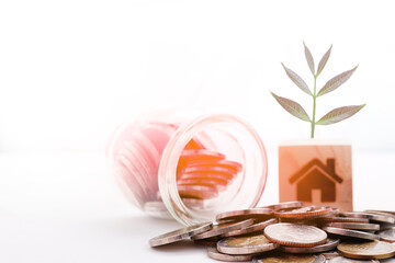 Obraz na płótnie Canvas Coins in a jar, close-up, money saving concept (spot focus)