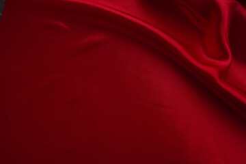 red fabric texture empty as waves (spot focus)