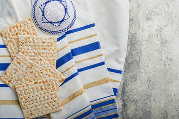 Passover celebration concept. Matzah, red kosher and walnut. Traditional ritual Jewish bread...