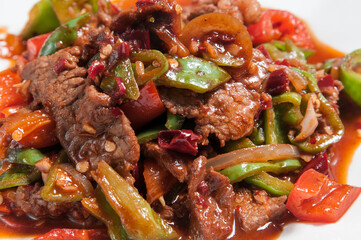 Meat with mix vegetables added inside foil paper and roasted inside the oven.
