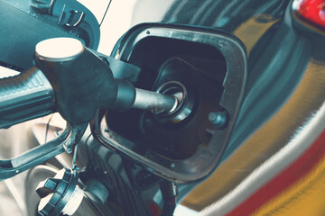 Refilling the car with fuel on a gas station