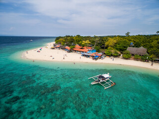White Beach Moalboal in Cebu, Palawan,Philippines. Ocean Water and Beach.