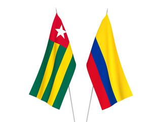 National fabric flags of Colombia and Togolese Republic isolated on white background. 3d rendering illustration.