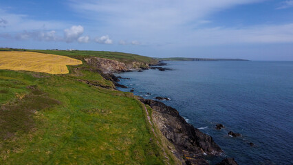 Beautiful views along the route of the Wild Atlantic Way. The green shores of Ireland. Seascape.