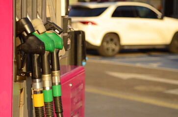 Refuel fill up with petrol gasoline. Petrol pump filling fuel nozzle in gas station. Petrol...