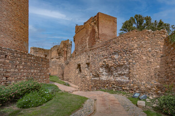 Fototapeta na wymiar The Alcazaba interior, citadel of Malaga city. Interiors and courtyards of a medieval fortress in the Arab, Moorish style. Andalusia, Spain