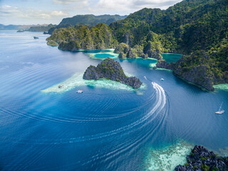 Twin Lagoon in Coron, Palawan, Philippines. Mountain and Sea. Lonely Boat. Tour A.