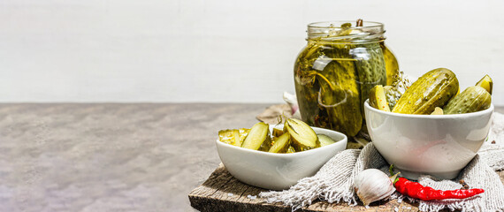 Pickled cucumbers for winter organic food. Jar of homemade gherkins, clean eating, vegan concept