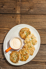 Hake fillet fried in batter. Sauce, fresh rosemary. Vegetarian healthy food concept