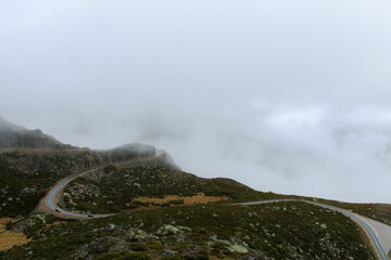 Winding road in the mountains Serra da Estrela or Star Mountain Range in Portugal. Wild Portuguese scenery.