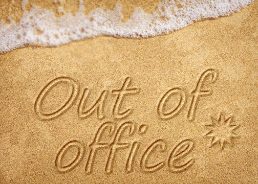 Out Of Office Sign On Beach Sand