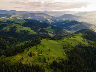 Carpathian mountains summer landscape, seasonal natural background with green hills, blue sky and white clouds. Panoramic view