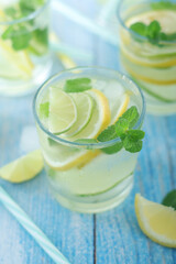 Glasses with lemon and lime lemonade