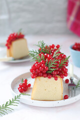 A biscuit decorated with red currant