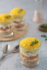 Mimosa salad in transparent glass