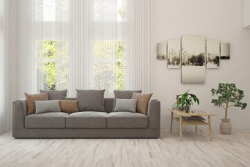 White living room with sofa and summer landscape in window. Scandinavian interior design. 3D illustration