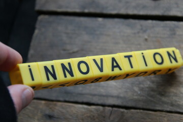 Innovation concept. Lettering from yellow cubes.