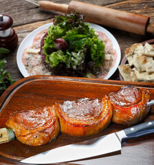 Steak rotisserie at the steakhouse, sliced picanha, Picanha