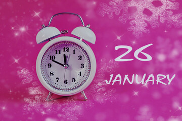 Calendar for January 26: a light alarm clock on a pastel background, numbers 26, the name of the month of January in English, bokeh