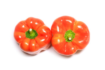 Two striped Holland bell peppers on white background