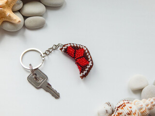Bead colorful key chain and sea coast