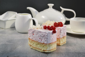 Berry Mousse Cake, decorated fresh red berries and grated white chocolate