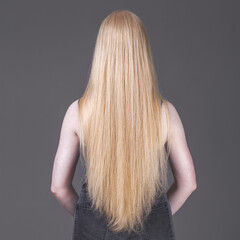 Back view long blonde female hair