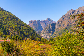 Picturesque view of himalayan mountain range and forest on a sunny cloudless day, Nepal