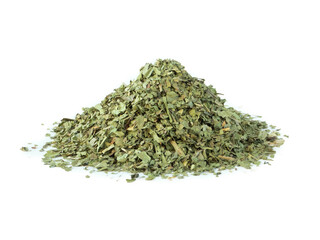 Pile of dry parsley flakes for seasoning isolated on white background