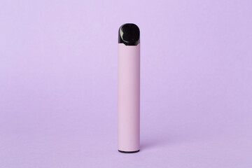 Disposable electronic cigarette on color background