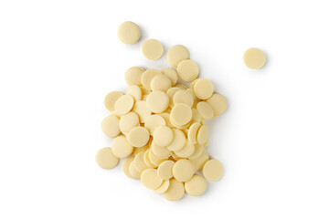 White chocolate drops or chips isolated on white background, cut out. Package design element with clipping path.