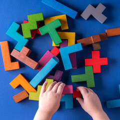 Concept of decision making process, logical thinking. Background with colorful shapes wooden blocks