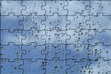 Puzzle pattern with rain drops on the glass surface with blue sky background