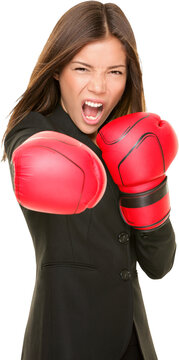 Business woman boxing punching ready to fight. Strength, power or competition concept image of beautiful strong Asian / Caucasian businesswoman isolated cutout PNG on transparent background.