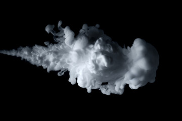 Close up shot of paint cloud spraying on a black background.