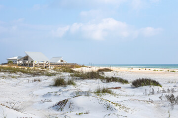 White sand dunes and a beach with park pavilions in Florida.