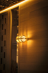 NYC Pattern / Texture: DECO LIGHT FIXTURE ON WOODEN WALL