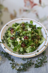 Green salad on a plate - 557063676