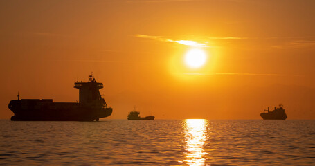 Ships under the sunset